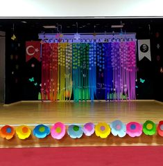 an empty stage with colorful decorations on it