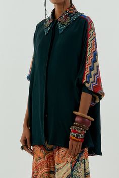 Deep teal mandala shirt with embroidered collar. Paired with printed sharara.
Component: 2
Pattern: Printed,Embroidered
Type Of Work: Mandala
Neckline: Spread Collar
Sleeve Type: Long
Fabric: Shirt-natural crepe, Sharara- mulmul
Color: Blue,Green
Other Details: 
Printed sharara
Note: Accessories and jewelry worn by the model is not for sale
Disclaimer: Variations in colour and the positioning of artwork may be different from that as displayed in the picture.
Occasion: Mehendi and Haldi - Aza Fas Shirt And Sharara, Printed Sharara, Blue Mandala, Embroidered Collars, Sharara Set, Deep Teal, Set For Women, Blue Shirt, Aza Fashion