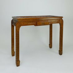 This stylish Asian inspired carved console table made of bass wood in a harmonizing golden honey finish is a delightful and functional. In the entry room of your home this console with its small drawer can be used to collect everything in your pockets ex. keys, change, and wallet or in your family room it can hold remotes or small personal items that are needed in arms reach. This table is an authentically charming piece for any room in your home it will bring a worldly impression as well as a g Carved Console Table, Entry Room, Golden Honey, Wood Console Table, Wood Console, Small Drawers, Asian Inspired, Console Table, Family Room