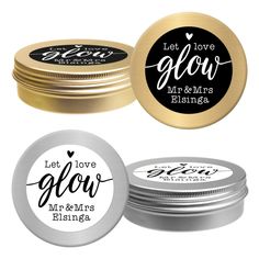 two tins with labels on them and one has a sticker that says let love glow