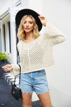 Introducing our Lenora Long Sleeve Pullover Top in classic cream. With its playful perforated details, this top adds a touch of fun to any outfit. Made from soft, lightweight fabric, it's perfect for a casual day out or a cozy night in. Get ready to turn heads in this unique top! Size Guide: Model is 5’62” tall, and has a 32.6” bust, 24.2”waist, & 35.9” hips. She is wearing a S / US 4 / AU 8. This top is true to size. Feature: Crew neckline. Pullover. Long sleevels.Perforated Knit Fabric. Not lined. Oversized Relaxed Fit. Material: 100% Acrylic. Care Instructions: Machine wash / Cold hand wash. Fall Vacation Pointelle Knit Top, Beige Pointelle Knit Sweater For Day Out, Fall Vacation Pointelle Knit Crochet Top, Pointelle Knit Beach Tops For Fall, Casual Cream Crochet Long Sleeve Top, Vacation Pointelle Knit Sweater With Crew Neck, Beach Fall Pointelle Knit Tops, Cream Open Knit Long Sleeve Tops, White Knit Top For Fall Vacation