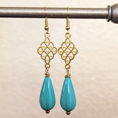 - New & Handmade - Materials: Turquoise Blue Czech Glass Teardrops, Gold Metal Filigree Connectors, 14k Gold-Filled Fishhook Ear Wires - Length: 2 3/4" Including Hook Elegant Blue Hypoallergenic Teardrop Earrings, Elegant Turquoise Drop Teardrop Earrings, Elegant Turquoise Teardrop Earrings As Gift, Elegant Turquoise Teardrop Pierced Earrings, Blue Filigree Dangle Jewelry, Elegant Turquoise Teardrop Earrings, Elegant Handmade Turquoise Teardrop Earrings, Vintage Christmas Earrings, Dangle Cross Earrings