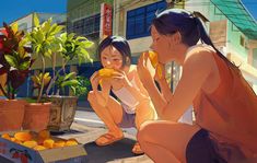 two young women sitting on the ground eating food from boxes next to oranges and potted plants