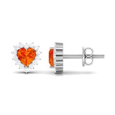 Product Details Create a story of love that is both passionate and enduring with these orange sapphire heart earrings with diamonds that are a stunning and unique piece of jewelry. The earrings feature a heart shape orange sapphire in each stud, surrounded by a halo of sparkling diamonds. The sapphires are a vibrant orange color, which is sure to catch the eye. The diamonds add a touch of luxury and sparkle to the earrings. Perfect to pair with any type of attire. Product Information SKU SHP-EAR Create A Story, Orange Cut, Orange Sapphire, Sapphire Earrings, Vibrant Orange, Sparkle Diamonds, Heart Earrings, Heart Shape, A Heart