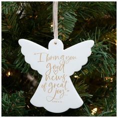 a christmas ornament hanging from a tree with the words, i know you good news of great joy