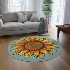 a living room with a couch and sunflower rug