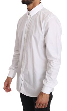 Dolce & Gabbana formal shirt. Model: GOLD, formalColor: White Fitting: Slim fit Logo details Made in Italy Material: 100% Cotton Designer Formal Collared Shirt, Designer Formal Shirt With Collar, Designer Collared Shirt For Formal Occasions, Designer Cotton Top For Formal Occasions, Luxury Cotton Formal Tops, Designer Formal Button-up Shirt, Designer Slim Fit Dress Shirt For Semi-formal Occasions, Luxury Slim Fit Tops For Formal Occasions, Luxury Formal Cotton Shirt