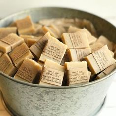 a metal bucket filled with small pieces of soap