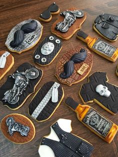 decorated cookies are laid out on the table to look like motorcyclist's gear