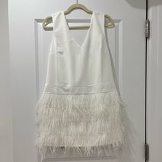 White Feather Skirt Dress Never Worn Chic White Mini Dress With Feather Trim, White Feather Trim Mini Dress For Spring, White Dress With Feather Trim For Spring, White Feather Skirt, Formal Wedding Guest Dress, Feather Skirt, Sleeveless Wrap Dress, Boho Mini Dress, White Feather