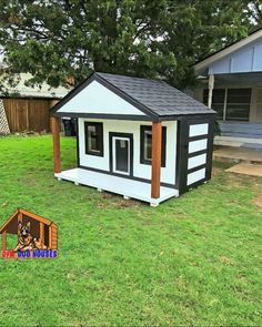 a dog house in the middle of a yard