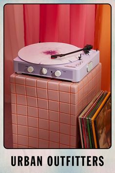 a record player sitting on top of a box