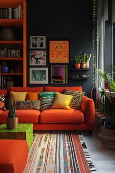 a living room with orange couches and colorful rugs