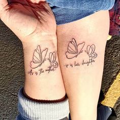 two people with matching tattoos on their arms that say, as if they were butterflies