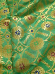 Dupatta length: 2.15 m Dupatta width: 0.84 m Blended Dry clean This dupatta is made of finely woven fabric and is decorated with intricate design and engravings Banarasi dupattas are characterised by brocade borders & pallus. They often have woven butas or jall on the body Cheap Banarasi Silk Dupatta With Zari Work, Festive Green Dupatta With Meenakari Detail, Green Banarasi Silk Dupatta With Meenakari, Green Meenakari Dupatta For Festive Occasions, Festive Green Meenakari Dupatta, Semi-stitched Pista Green Traditional Wear With Motifs, Green Brocade Dupatta With Zari Work, Transitional Green Dupatta With Meenakari Details, Transitional Green Dupatta With Pallu