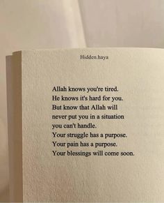 an open book with a poem written on the page in front of it, which reads'hidden hajya '