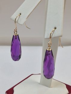 "SOLID 14KT YELLOW GOLD DANGLE EARRINGS NATURAL AMETHYST IS 8x20 mm EACH (20.00 Tcw) EARRING LENGTH IS 1.25\" INCHES WITH GIFT BOX" Gold Dangle Earrings, Gold Earrings Dangle, Jewelry Earrings Dangle, Dangle Drop Earrings, Dangle Earrings, Amethyst, Gift Box, Jewelry Earrings, Yellow Gold