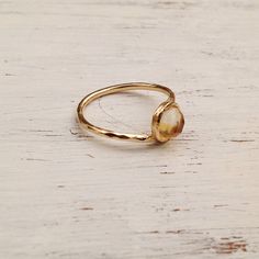 Citrine ring,gold ring,citrine ring gold,dainty ring,gemstone ring,yellow citrine ring Dainty gold filled ring with natural yellow citrine 6mm faceted stone. Beautiful ring for the coming fall-winter Sizes 5-8.5 Please select your ring size All my jewelry are packed in an elegant gift box. If you want to give it as a gift you can specify the address and I'll be happy to send it on your behalf. To see more, please visit my shop at : http://www.etsy.com/shop/amitvtamar Thank you for looking :) Ple Dainty Citrine Ring Jewelry, Handmade Citrine Crystal Ring As Gift, Minimalist Citrine Gemstone Ring, Handmade Gold Citrine Crystal Ring, Handmade Adjustable Citrine Rings, Gold Dainty Ring, Yellow Citrine Ring, Yellow Citrine, Gold Filled Ring