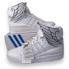 Brand: Adidas X Jeremy Scott Wings 4.0 "Cloud White" Gx9445 Gender: Unisex (Sized In Men's) Color: Cloud White/Cloud White/Core Black Size: Men's 7 Women's 8 Uk 6.5 Eu 40 Condition: These Shoes Are New With Tags And Box. The Lid Of The Box Is Missing. Please Refer To All Photos. Shipping Time: Your Item Ships Within 1 Business Day. Step Into A World Of Style And Innovation With The Adidas X Jeremy Scott Wings 4.0 "Cloud White" Sneakers. Created In Partnership With Visionary Fashion Designer Jeremy Scott, These Shoes Are A Testament To Their Iconic Collaboration. The Cloud White Color Scheme Adds A Touch Of Purity And Elegance To This Already Legendary Silhouette. Crafted With Precision Summit White Sneakers For Streetwear With Round Toe, Summit White Sneakers For Streetwear, Summit White Round Toe Sneakers For Streetwear, White High-top Adidas Basketball Shoes, Adidas White High-top Sneakers With Logo, Adidas White Leather Basketball Shoes, Adidas High-top Sneakers White Boost Midsole, Adidas White High-top Sneakers With Abzorb Midsole, Adidas White High-top Sneakers With Boost Midsole