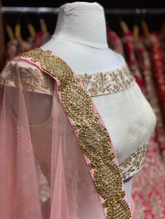 Dusky peach heavy kundan border lehenga with contrasting pearl white floral zardozi embroidery off shoulder blouse and net border dupatta. Fabric: Raw Silk This outfit can be customized in multiple colors and specific to client measurements. 90 days of production time is required and are for bulk orders only! Orders are processed in store only! Final fittings/alterations not included. Minimum Order Quantity- 4 pieces Designer Peach Lehenga With Intricate Embroidery, Peach Choli With Sheer Dupatta For Weddings, Peach Choli With Sheer Dupatta For Reception, Semi-stitched Peach Choli With Sheer Dupatta, Peach Lehenga With Resham Embroidery In Traditional Drape, Peach Lehenga With Resham Embroidery, Peach Semi-stitched Choli With Sheer Dupatta, Anarkali Peach Choli For Wedding, Peach Lehenga With Pallu For Reception