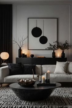 a living room filled with lots of furniture and candles on top of the coffee table