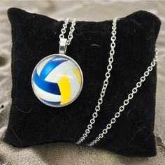 Volleyball Cabochon Pendant Gift Vb Player Silver Necklace Beach Sand Team Sport Embrace Your Love For Volleyball With This Unique Necklace That's Sure To Create A Buzz And Leave A Lasting Impression. Great Gift! For Volleyball Enthusiasts, Parents, Relatives, Fans, Sports Mom, Brand New From Manufacturer. Perfect Condition. Nwt Theme: Beach Volleyball, Sand Volleyball, Hobby, League Team, Sports, Summer, Player, Serve Design: Volleyball, Rounded Cabochon Front, Clear Resin Color: White, Blue, Y Sand Volleyball, Fan Necklace, Glossy Makeup, Rhinestone Statement Necklace, Beach Volleyball, Sports Mom, Cabochon Pendant, Long Pendant Necklace, Team Sports