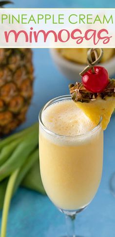 the pineapple cream mimosa is garnished with a cherry