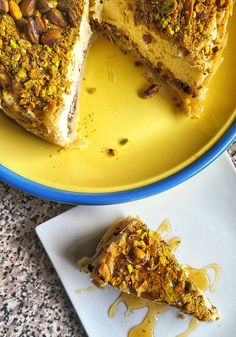 a piece of cake sitting on top of a yellow plate next to a slice of pie