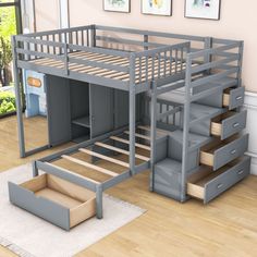 a loft bed with stairs and storage drawers