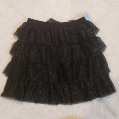 New With Tag Black Sparkle Skirt For Girls. Available In Different Sizes. Please See All Photos For More Details. Xs- 4/5 S- 6/6x L- 10/12 Xl- 14/16 Girls Poodle Skirt, Mermaid Tail Skirt, White Plaid Skirt, Holiday Skirt, Black Sequin Skirt, Christmas Skirt, Holiday Skirts, Sparkle Skirt, Poodle Skirt