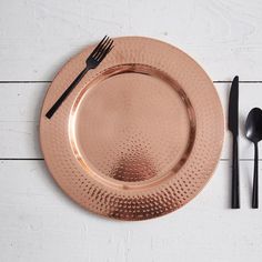 Copper charger with a hand-hammered finish, adding elegance to any table setting; perfect for formal or casual gatherings. Copper Charger Plates, Copper Plates, Blue Harvest, Starter Plates, Charger Plate, Old World Style, Tableware Collection, Charger Plates, Hammered Copper