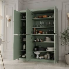 an open cabinet in the corner of a room