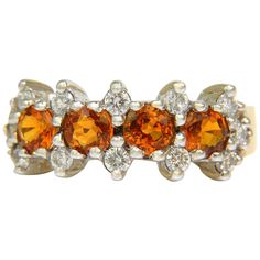 1.77ct. Natural Orange Sapphires Clean VS Clarity Vivid orange saturation Round cuts. Each: 4.5mm .50ct. round diamonds. Fully cut and faceted. G-color, VS-2 clarity 18kt. yellow gold 8.37mm wide 6.9 grams Current size 6.25 we can resize, please inquire $4500 appraisal will accompany Diamond Band Rings, Baguette Diamond Band, Sapphire And Diamond Band, Orange Gem, Sapphire Band, Modern Engagement Rings, Ringe Gold, Orange Sapphire, Gold Band Ring