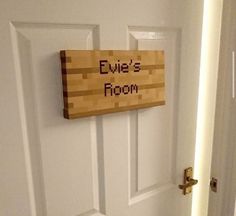 a door with a sign that says evil's room on it