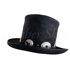 Make a chic style statement with Leather Skin shop’s Top hat. This hat is made from genuine leather (cowhide), giving it a smooth and luxurious feel. What’s more? The Top hat is comfortable to wear. Available in an affordable price, it makes for the perfect accessory to any outfit. Some of the things that set this hat apart: The band of the top hat is lined with metallic embellishments, giving it a fancy and attractive look. The flat crown of the hat and the slightly curved brim adds to the sophistication and class. It is available in many various sizes, and you can choose the one that best fits you. The high-quality full-grain leather adds to its durability and longevity. Intricate stitching, extensive detailing, and unique design – this is what makes this hat a wardrobe essential. Add on Wide Brim Leather Fedora For Formal Events, Wide Brim Leather Fedora For Formal Occasions, Leather Hat With Flat Brim For Formal Occasions, Fitted Leather Hat With Curved Brim, Formal Leather Hat With Flat Brim, Formal Flat Brim Leather Hat, Chic Leather Wide Brim Hat, Chic Wide Brim Leather Hat, Black Leather Hat With High Crown