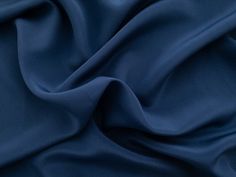 This deadstock silk features a subtle crepe texture. It has amazing drape and a matte hand. This fabric is perfect for blouses, dresses, skirts, and more. It is slightly sheer and may require a lining depending on the garment. Crepe Fabric Texture, Navy Fabric Texture, Blue Embroidered Silk Fabric, Printed Crepe Silk Fabric, Crepe Fabric Blue, Garment Factory, Garment Fabric, Silk Material, Silk Crepe