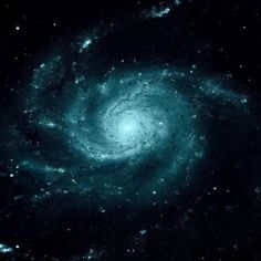 an image of a spiral galaxy in the night sky