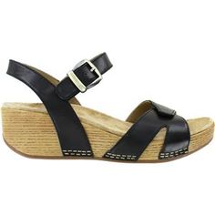 The Dansko Laurie is a casual women's leather wedge heel backstrap sandal with two adjustable straps and memory foam footbed. These Dansko Laurie Black Burnished Calf Leather Women's Sandals have the following features:   Burnished leather uppers  Adjustable sandal on stapled construction wedge heel  Microfiber socklining with Aegis Microbe Shield odor control  Dual density EVA footbed with memory foam for cushioning and support  Lightweight, shock absorbing PU wedge  Rubber outsole for long las Casual Wedge Sandals With Strap, Adjustable Wedge Heel Sandals With Strap, Leather Closed Toe Wedge Sandals With Adjustable Strap, Adjustable Leather Wedge Sandals With Strap, Black Leather Wedge Sandals With Adjustable Strap, Leather Slip-on Wedge Sandals With Round Toe, Dansko Rowan, Black Slip-on Clogs With Buckle Closure, Leather Slip-on Wedge Sandals With Buckle Closure