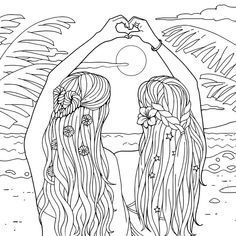 two girls standing in front of the ocean with their hands up and looking at each other