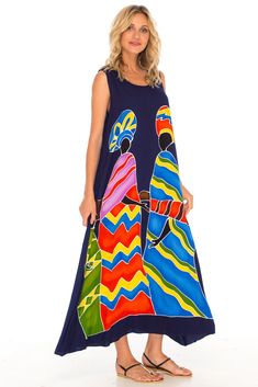 Well crafted and uniquely made, this sleeveless dress will not only make a statement but will give you long-lasting comfort all day long. Enjoy the hand-painted tribal design. Flowy and lightweight material top off this lounge dress. Take with you on vacation and use as a swimsuit coverup. Sleeveless tank dress Hand-painted tribal designs Made from soft and lightweight rayon material Machine wash with like colors, hang to dry Artistic Summer Dresses For The Beach, Artistic Summer Beach Dresses, Artistic Multicolor Sleeveless Dress, Artistic Multicolor Beach Dress, Navy Families, Woman Design, Lounge Dress, Black Families, Navy Women