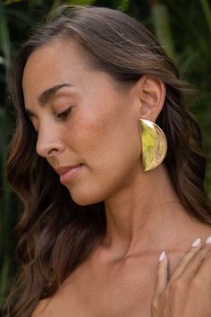 Meet tha La Lumiere in Gold. A new take on a gold statement earring, crafted into a half moon shape. Our latest gold earring takes you from day to night, from poolside to beachside, from beach to bar and everything in between. Gold Statement Earring, Modern Gold Jewelry For The Beach, Elegant Brass Earrings For Summer, Yellow Gold Drop Earrings For Summer, Chic Gold Earrings For Summer, Summer Party Yellow Gold Jewelry, Modern Gold Earrings For Summer, Chic Yellow Gold Jewelry For Summer, Chic Yellow Gold Jewelry