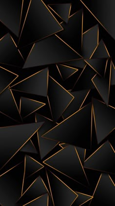 an abstract black and gold background with triangles