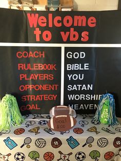 a football themed welcome table at a sports event