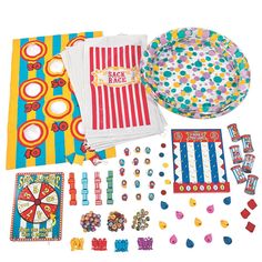 an assortment of party supplies including napkins, plates and candy