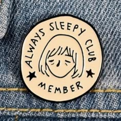 a badge that says always sleepy club member on it's lapel in the pocket of a pair of jeans