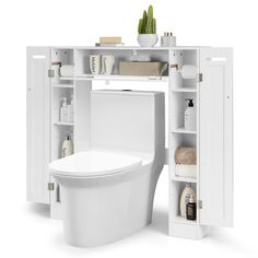 a white toilet sitting next to a cabinet filled with bathroom items on top of it