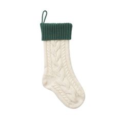 a green and white stocking hanging from the ceiling