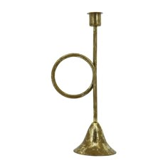 a brass candle holder with a circular handle