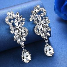 Luxurious Flower Shaped Silver Color Crystal Drop Earrings for the Bride or Her Bridesmaids. 5 Petal Flower, Long Bridal Earrings, Ladies Gifts, Bridal Earrings Studs, Unique Statement Necklace, Silver Crystal Earrings, Formal Earrings, Crystal Earrings Wedding, Starburst Earrings