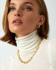 This chunky paperclip necklace is a perfect statement piece. Super easy to wear and so versatile, it will add an effortlessly cool vibe to your casual outfits and edge to your dressy looks. We love it worn solo (who doesn't love a single statement chain) or layered with a pendant necklace or a string of pearls for that fashion forward, more is more kind of look.  – This chunky paperclip necklace measures approximately 40 cm in length, comes with 6 cm extension chain.   Read more: How to style a Chunky Gold Chain Necklace, Paper Clip Chain Necklace, Chunky Choker Necklace, Floating Pearl Necklace, Chunky Choker, Chunky Chain Necklaces, String Of Pearls, Dainty Gold Necklace, Stylish Earring